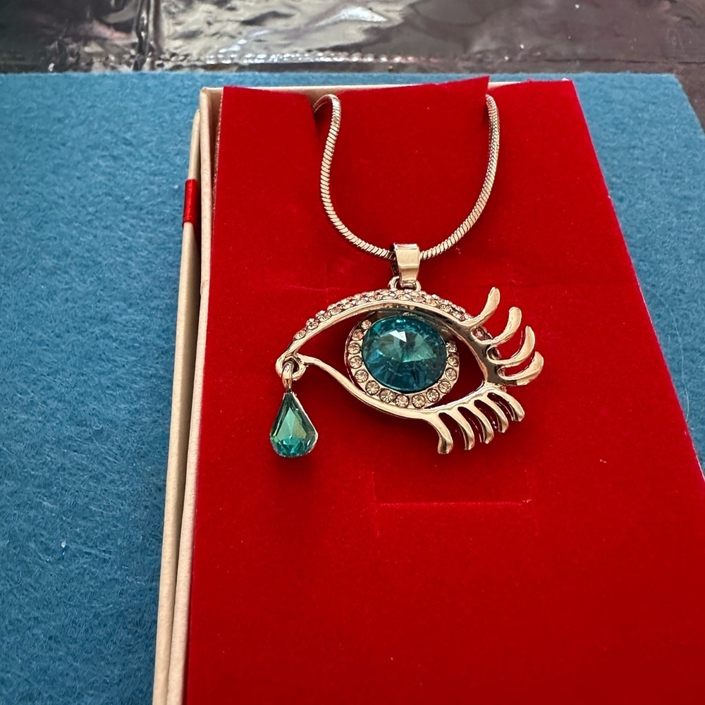 Eye Pendant Necklace with Teal Accents